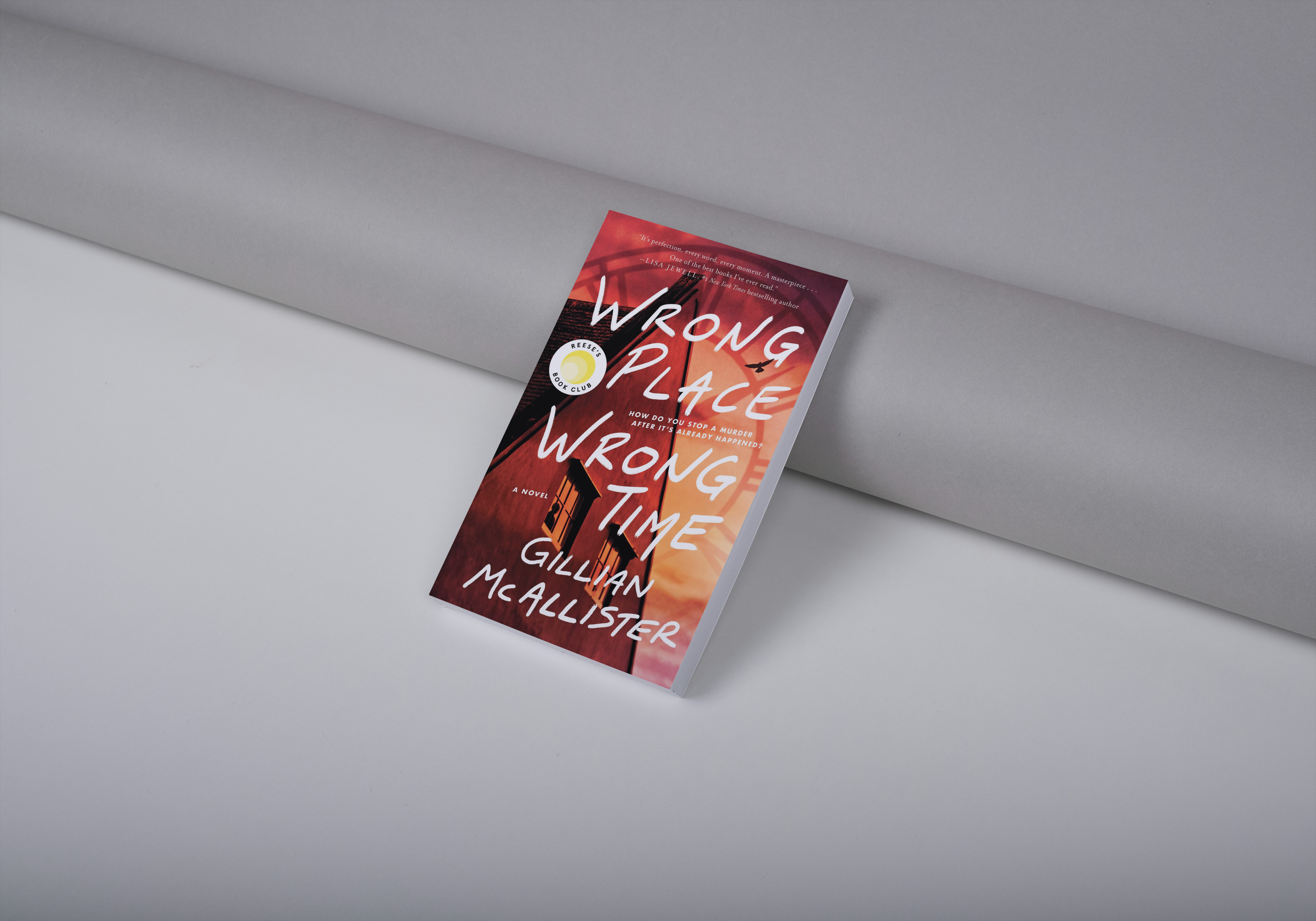 photo of book wrong place wrong time by Gillian McAllister leaning against a wall