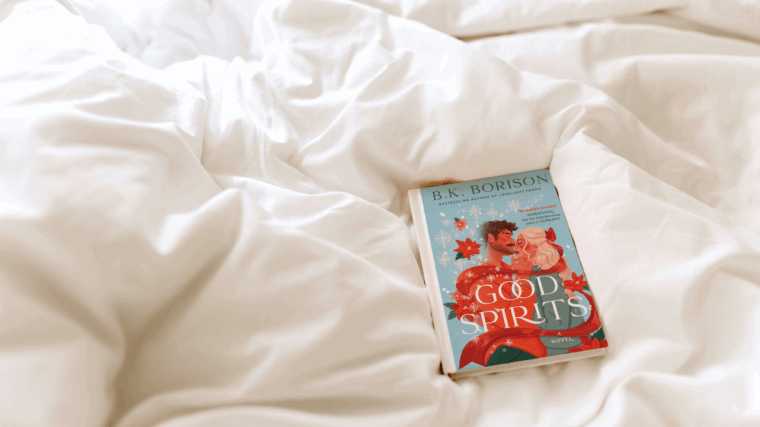 the book good spirits by b.k. borison laying on a comforter of a bed